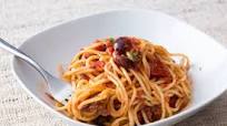 Spaghetti Puttanesca (Tomato, anchovy, olive and garlic spaghetti) Spaghetti Puttanesca (Tomato, anchovy, olive and garlic spaghetti)