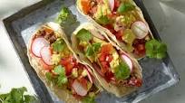 Breakfast tacos with scrambled eggs, beef mince and tomato salsa Breakfast tacos with scrambled eggs, beef mince and tomato salsa