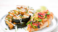 Tortilla Chicken with elote-style acorn squash Tortilla Chicken with elote-style acorn squash