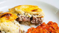TAVE KOSI - Meat and rice baked in yogurt in the Albanian way TAVE KOSI - Meat and rice baked in yogurt in the Albanian way