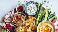 Middle Eastern Inspired Layer Dip with Hummus, Muhammara, Baba Ganoush, Herbed Labneh and Shirazi Salad Middle Eastern Inspired Layer Dip with Hummus, Muhammara, Baba Ganoush, Herbed Labneh and Shirazi Salad