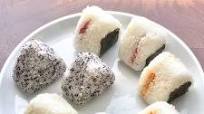 Omusubi (Japanese rice balls) with tuna, salted salmon, and umeboshi Omusubi (Japanese rice balls) with tuna, salted salmon, and umeboshi