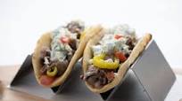 Mediterranean Steak Strip Gyros with tzatziki sauce and banana peppers Mediterranean Steak Strip Gyros with tzatziki sauce and banana peppers