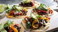 Sheet-Pan Tostadas With Black Beans and Peppers Sheet-Pan Tostadas With Black Beans and Peppers