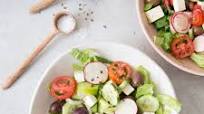Greek Salad With Lettuce and Lemon Garlic Dressing Greek Salad With Lettuce and Lemon Garlic Dressing