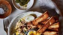 Hummus Breakfast Bowl With Toast Soldiers, 7 Minute Egg, Avocado, Goat Feta And Sumac Hummus Breakfast Bowl With Toast Soldiers, 7 Minute Egg, Avocado, Goat Feta And Sumac