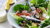 Caesar salad with grilled sardines Caesar salad with grilled sardines