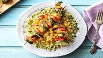 Vibrant Veggie Skewers over Herbed Couscous with a Corn Relish Vibrant Veggie Skewers over Herbed Couscous with a Corn Relish