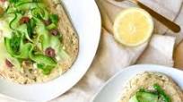 Hummus Naan Pizzas with Cucumber and Olives Hummus Naan Pizzas with Cucumber and Olives