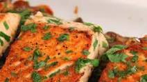 Seared Salmon Served Over a Bed of Sauteed Mushroom and Spinach Seared Salmon Served Over a Bed of Sauteed Mushroom and Spinach