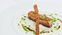 Slowly braised belly of pork with apple soup, garlic purée and Port jus Slowly braised belly of pork with apple soup, garlic purée and Port jus