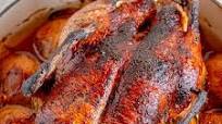 Whole Roasted Duck Over Potatoes Whole Roasted Duck Over Potatoes