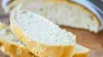 Focaccia topped with basil and Parmesan cheese Focaccia topped with basil and Parmesan cheese