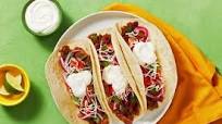 Diced Pork Carnitas Tacos with Pickled Onion and Monterey Jack Cheese Diced Pork Carnitas Tacos with Pickled Onion and Monterey Jack Cheese