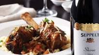 Lamb shanks with currants, cinnamon and almonds Lamb shanks with currants, cinnamon and almonds