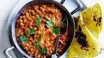 Chana masala with yoghurt and flatbread Chana masala with yoghurt and flatbread