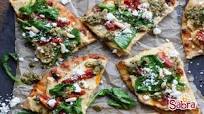Hummus Flatbread with SunDried Tomatoes, Spinach and Pesto Hummus Flatbread with SunDried Tomatoes, Spinach and Pesto