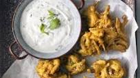 Red onion & chilli bhajis with mint & garlic raita Red onion & chilli bhajis with mint & garlic raita