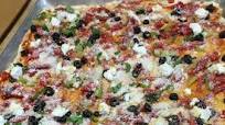 Green and red tomato pizza with grilled peppers and goat cheese Green and red tomato pizza with grilled peppers and goat cheese