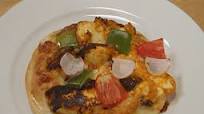 Paneer Tikka Pizza Paneer Tikka Pizza