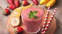Delicious strawberry banana smoothie with orange juice Delicious strawberry banana smoothie with orange juice