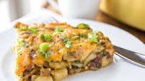 Cheesy Breakfast Bake with Crispy Bacon, Spinach, Caramelized Onions and Diced Potatoes Cheesy Breakfast Bake with Crispy Bacon, Spinach, Caramelized Onions and Diced Potatoes