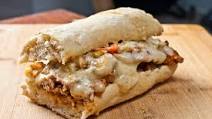 Shaved BBQ pork sirloin sandwich with smoked Gouda and garlic aioli Shaved BBQ pork sirloin sandwich with smoked Gouda and garlic aioli