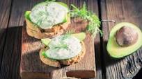 Avocado with tzatziki and toasted pitta bread Avocado with tzatziki and toasted pitta bread