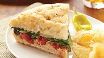 Stuffed Focaccia with Spinach, Tomatoes, Olives and Mozzarella Stuffed Focaccia with Spinach, Tomatoes, Olives and Mozzarella