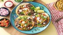 Cheesy Corn Tostadas with Black Beans and Tomato Cheesy Corn Tostadas with Black Beans and Tomato