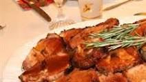Rosemary-Scented Pork Loin Stuffed With Roasted Garlic, Dried Apricots and Cranberries and Port Wine Pan Sauce Rosemary-Scented Pork Loin Stuffed With Roasted Garlic, Dried Apricots and Cranberries and Port Wine Pan Sauce