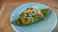Sea bass steamed in banana leaf Sea bass steamed in banana leaf