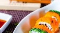 Spicy Salmon Sushi roll with inside-out fish roes Spicy Salmon Sushi roll with inside-out fish roes