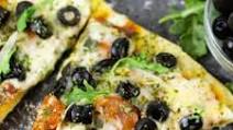 Homemade Grilled Pizza with Hojiblanca Olives from Spain and Spanish Chorizo Sausage Homemade Grilled Pizza with Hojiblanca Olives from Spain and Spanish Chorizo Sausage