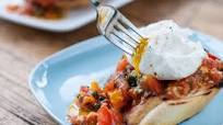 Plum tomato bruschetta with poached eggs Plum tomato bruschetta with poached eggs