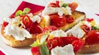 BRUSCHETTE WITH CHERRY TOMATOES AND BURRATA BRUSCHETTE WITH CHERRY TOMATOES AND BURRATA