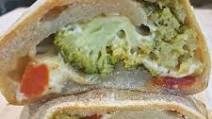 Easy Cheesy Broccoli and Tomato Stromboli Easy Cheesy Broccoli and Tomato Stromboli
