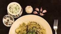 HOMEMADE CHICKEN BIRYANI WITH CUCUMBER & GREEN ONION RAITA HOMEMADE CHICKEN BIRYANI WITH CUCUMBER & GREEN ONION RAITA