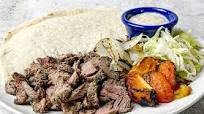 Beef Shawarma Wrap with Creamy Tzatziki Sauce Beef Shawarma Wrap with Creamy Tzatziki Sauce