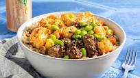 Beef donburi rice bowl with edamame and kimchi-lime vegetables Beef donburi rice bowl with edamame and kimchi-lime vegetables