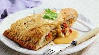 Tuna Melt Calzone with Cheddar Cheese Sauce Tuna Melt Calzone with Cheddar Cheese Sauce