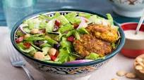 Mediterranean salad with falafel, Kalamata olives, and Marcona almonds Mediterranean salad with falafel, Kalamata olives, and Marcona almonds
