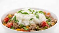 Spicy Sausage and Pepper Gumbo with Rice and Green Onions stovetop cooking Spicy Sausage and Pepper Gumbo with Rice and Green Onions stovetop cooking