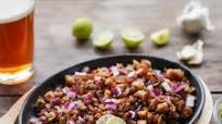 Pork Sisig (Charcoal Grilled, Served on a Sizzling Platter) Pork Sisig (Charcoal Grilled, Served on a Sizzling Platter)