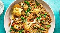 Vegetable biryani with green raita Vegetable biryani with green raita