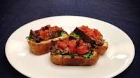 Beef Tenderloin Bruschetta with Goat Cheese, Arugula, and Roasted Tomatoes Beef Tenderloin Bruschetta with Goat Cheese, Arugula, and Roasted Tomatoes