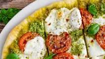 Pesto Pizza with Fresh Mozzarella and Tomatoes Pesto Pizza with Fresh Mozzarella and Tomatoes