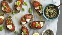 Bruschetta with Pesto, Mozzarella and Tomatoes Bruschetta with Pesto, Mozzarella and Tomatoes