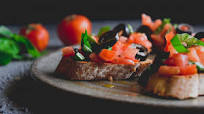 This tomato and olive bruschetta recipe is the perfect appetiser to make when you’re in a rush This tomato and olive bruschetta recipe is the perfect appetiser to make when you’re in a rush