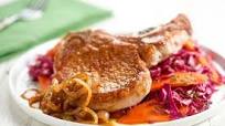 German Beer Garden Pork Chop with apple braised carrots and red cabbage German Beer Garden Pork Chop with apple braised carrots and red cabbage